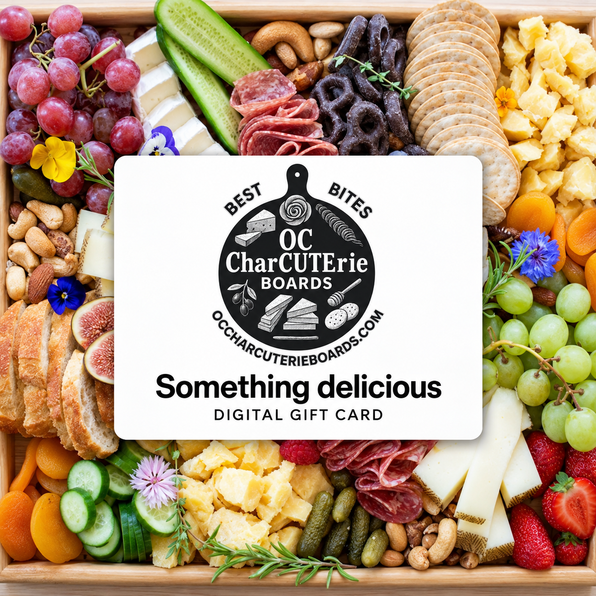 OC Charcuterie Boards digital gift card over a charcuterie board with cheese, meats, fruit and crackers.